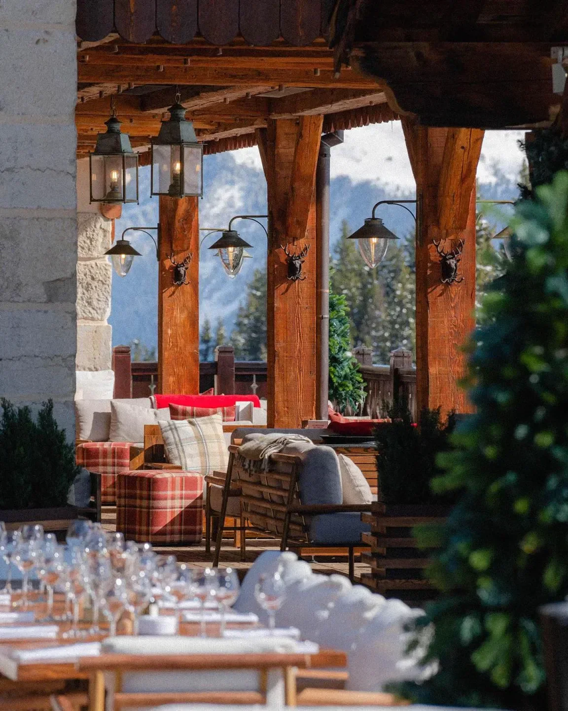 Cozy patio at La Table des Airelles in Courchevel with mountain views and elegant decor.