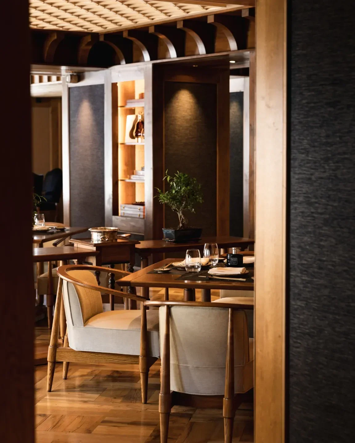 Cozy dining area at Nama restaurant in Courchevel, featuring elegant chairs and tables